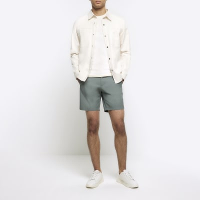 Green tapered fit shorts | River Island