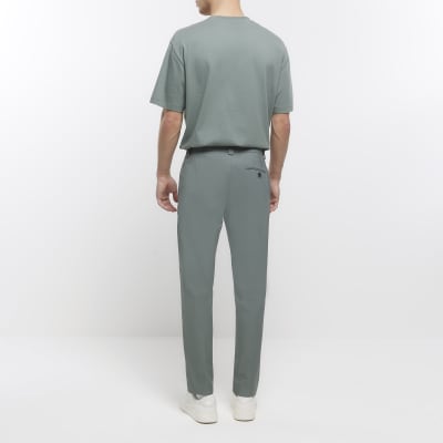 Green tapered fit smart trousers