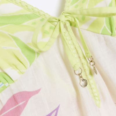 Green tropical print cami playsuit River Island