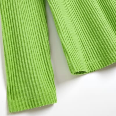 Green turtleneck long sleeve top