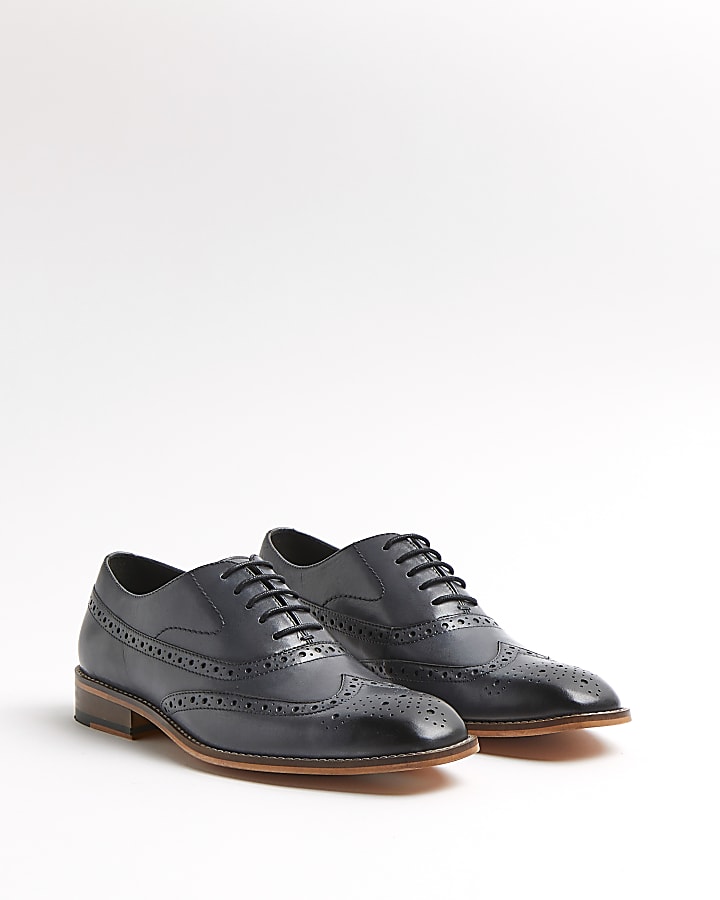 Grey brogue lace up shoes