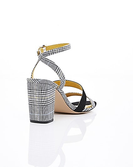 360 degree animation of product Grey check strappy asymmetric sandals frame-14