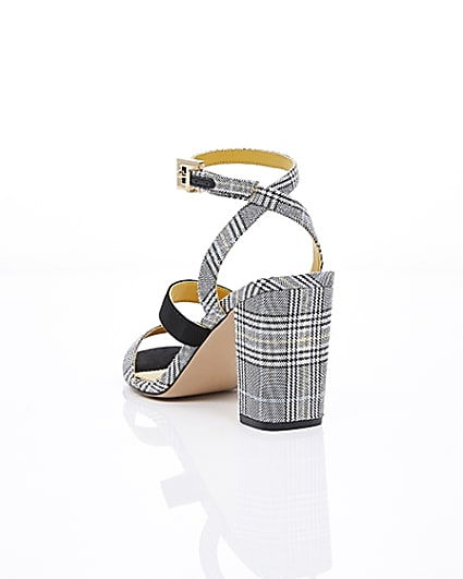 360 degree animation of product Grey check strappy asymmetric sandals frame-18