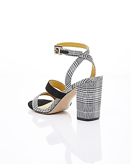 360 degree animation of product Grey check strappy asymmetric sandals frame-19