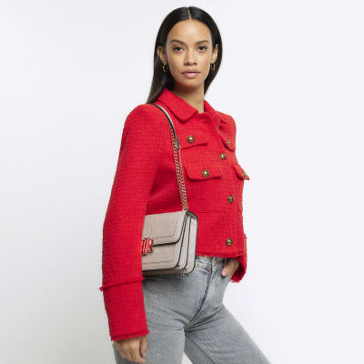 Grey embossed RI lock shoulder bag River Island