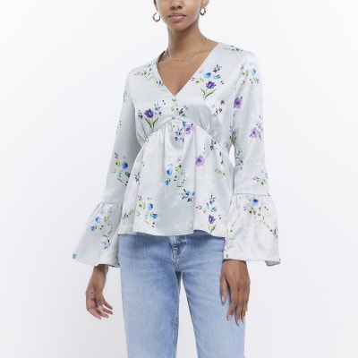 River Island floral volume sleeve button front blouse in blue