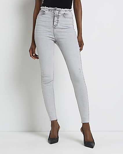 Grey mid rise skinny jeans