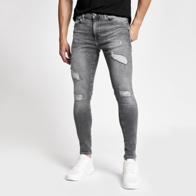 Grey Ollie spray on skinny ripped jeans 