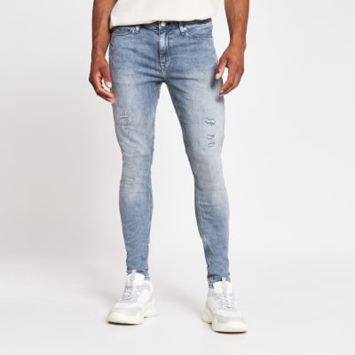 Grey Ollie spray on skinny ripped jeans River Island