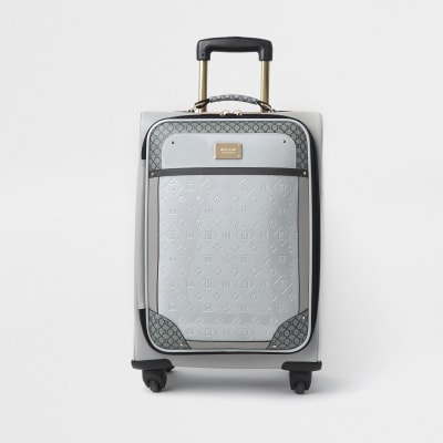 Grey patent monogram embossed suitcase River Island
