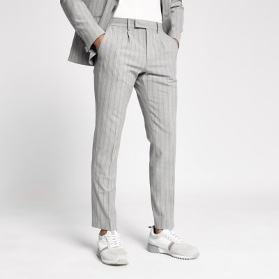 Grey pinstripe skinny suit trousers | River Island