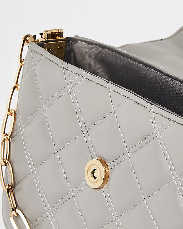 Grey quilted cross body bag