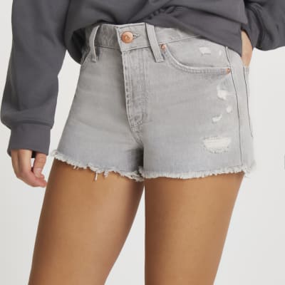 ripped mid rise jeans