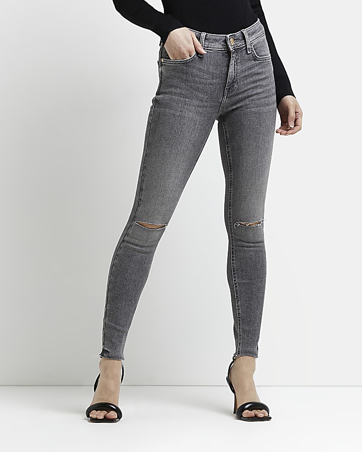 Grey ripped mid rise skinny jeans