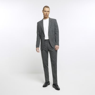 black suit and grey pants