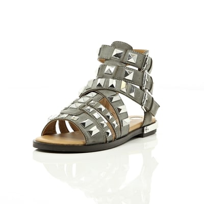 360 degree animation of product Grey studded Gladiator sandals frame-1
