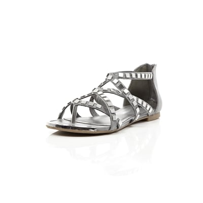 360 degree animation of product Grey studded metal gladiator sandals frame-1