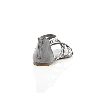 360 degree animation of product Grey studded metal gladiator sandals frame-14