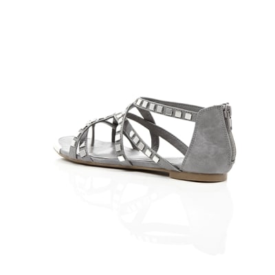 360 degree animation of product Grey studded metal gladiator sandals frame-19