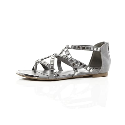 360 degree animation of product Grey studded metal gladiator sandals frame-23