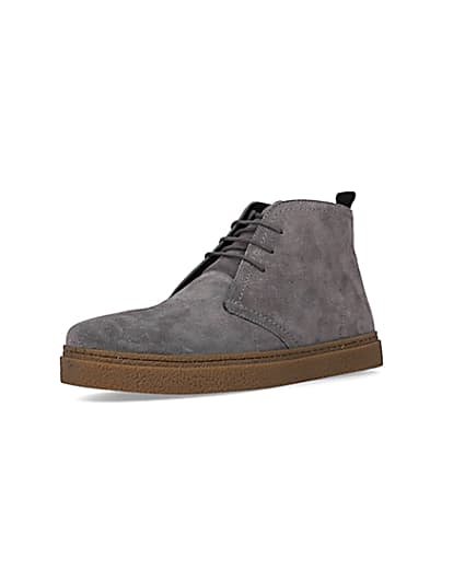 360 degree animation of product Grey Suede lace up Chukka boots frame-0