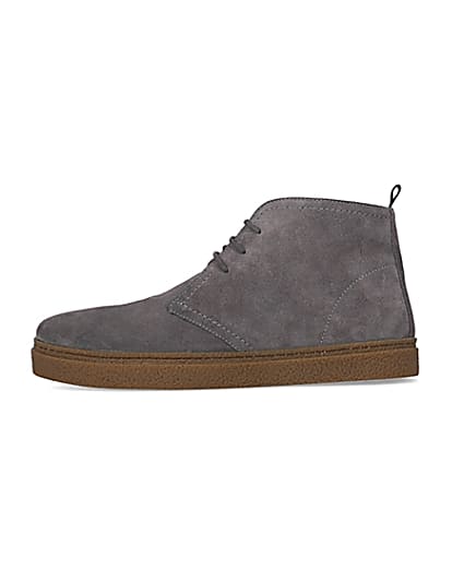 360 degree animation of product Grey Suede lace up Chukka boots frame-3