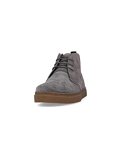 360 degree animation of product Grey Suede lace up Chukka boots frame-22