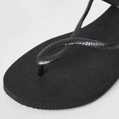 black rubber flip flops