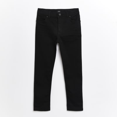 Kids black skinny Sid jeans River Island