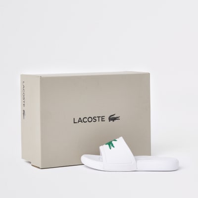 lacoste junior sliders