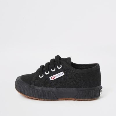 Kids Superga black lace-up plimsolls