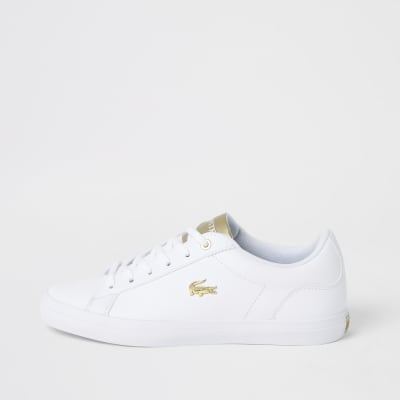 lacoste white and gold trainers