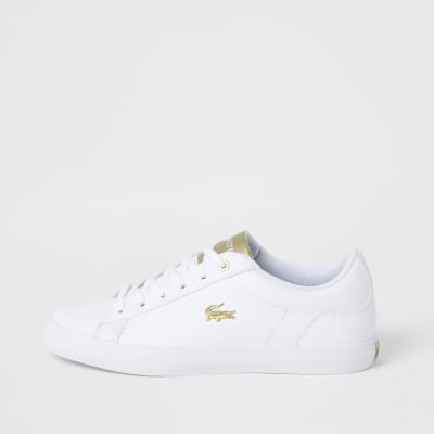 lacoste shoes gold logo