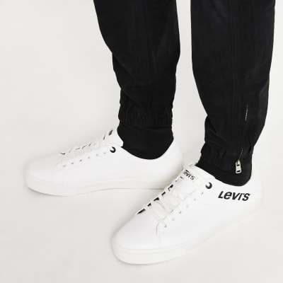 white levi trainers