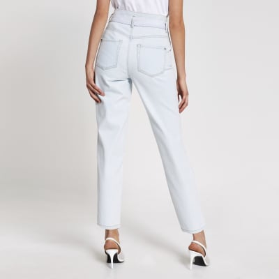 Light blue high rise belted tapered jeans