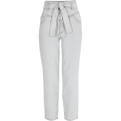 Light blue high rise belted tapered jeans