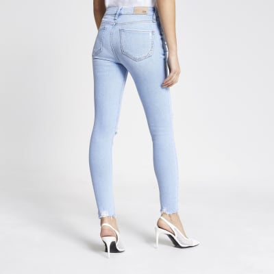 Light blue ripped Amelie mid rise skinny jean