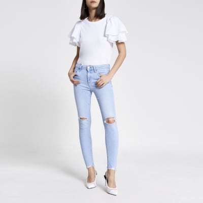 Light blue ripped Amelie mid rise skinny jean