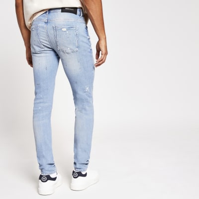light blue skinny ripped jeans