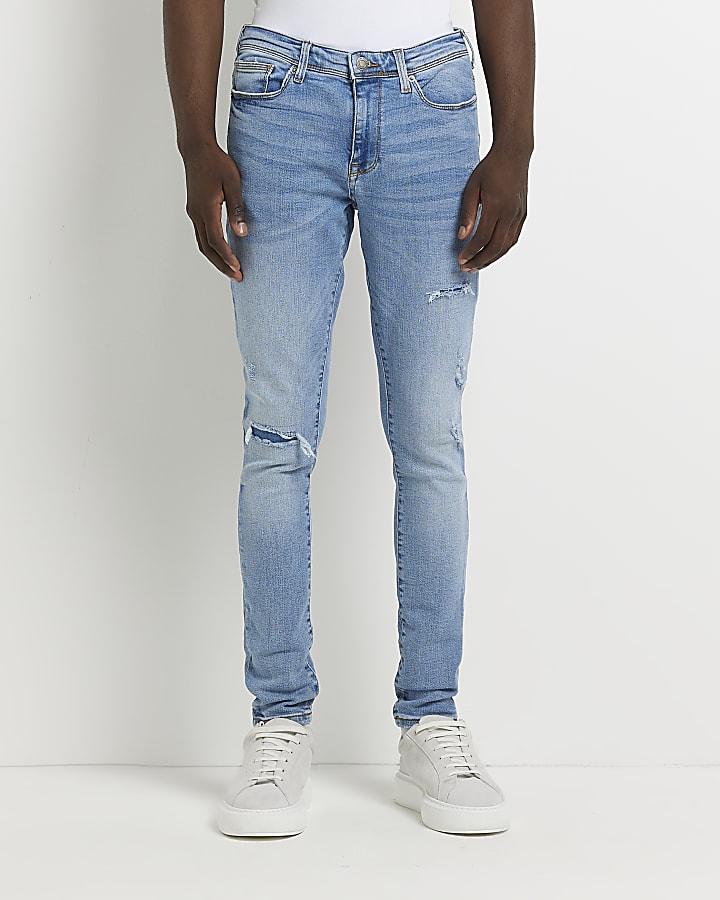 Light blue spray on ripped skinny fit jeans