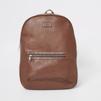 Light brown RI monogram trim rucksack