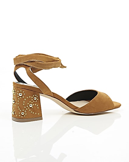 360 degree animation of product Light brown tie up embellished heel sandals frame-11