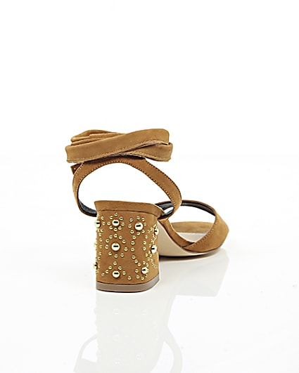 360 degree animation of product Light brown tie up embellished heel sandals frame-14