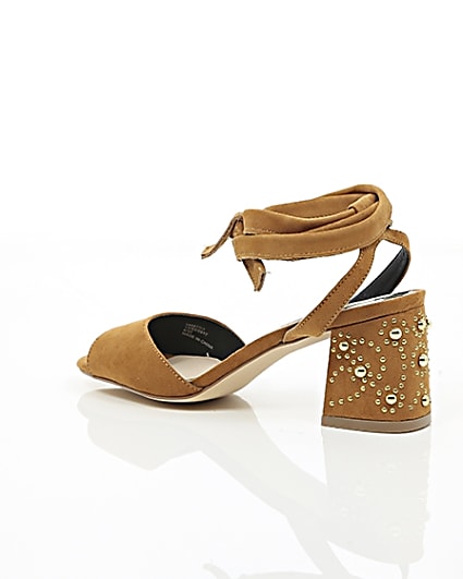 360 degree animation of product Light brown tie up embellished heel sandals frame-19