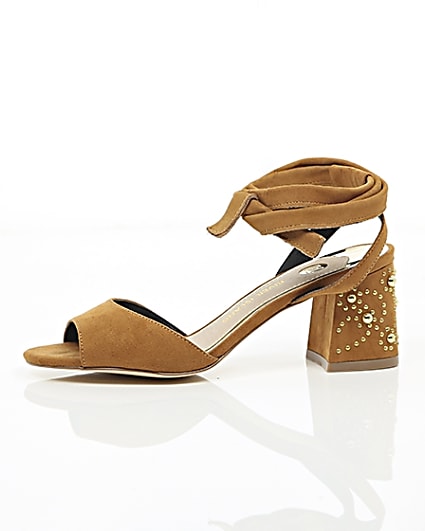 360 degree animation of product Light brown tie up embellished heel sandals frame-22