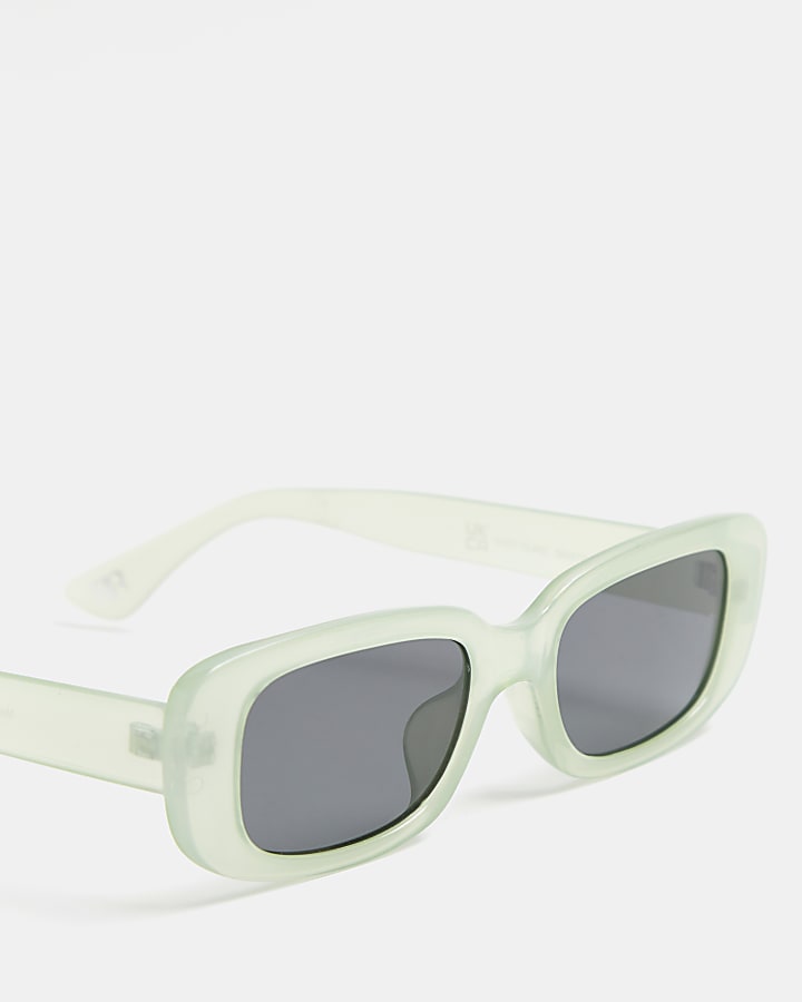 Light green oval frame sunglasses