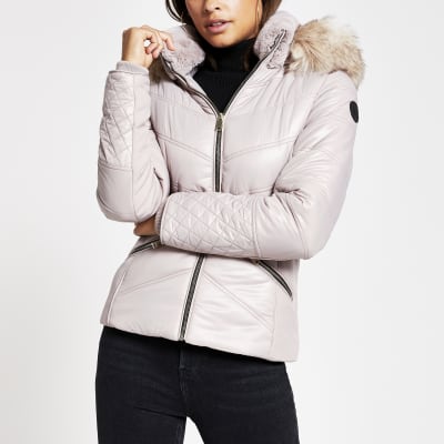 light pink coat with fur hood