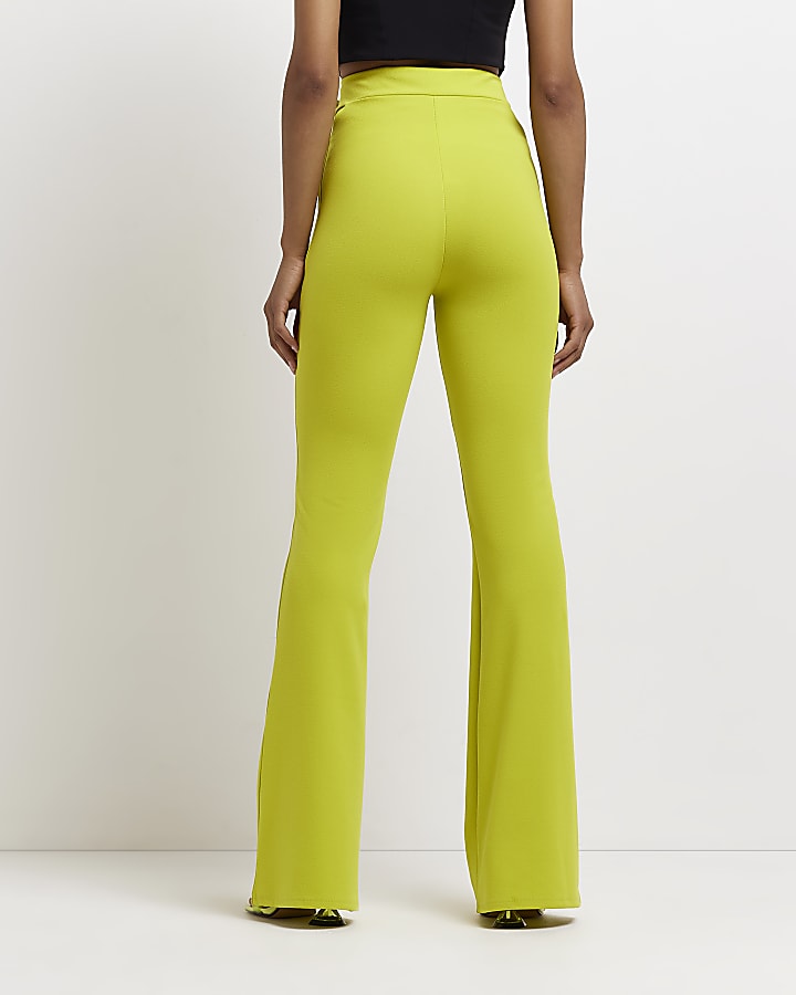Lime green cut out flared trousers