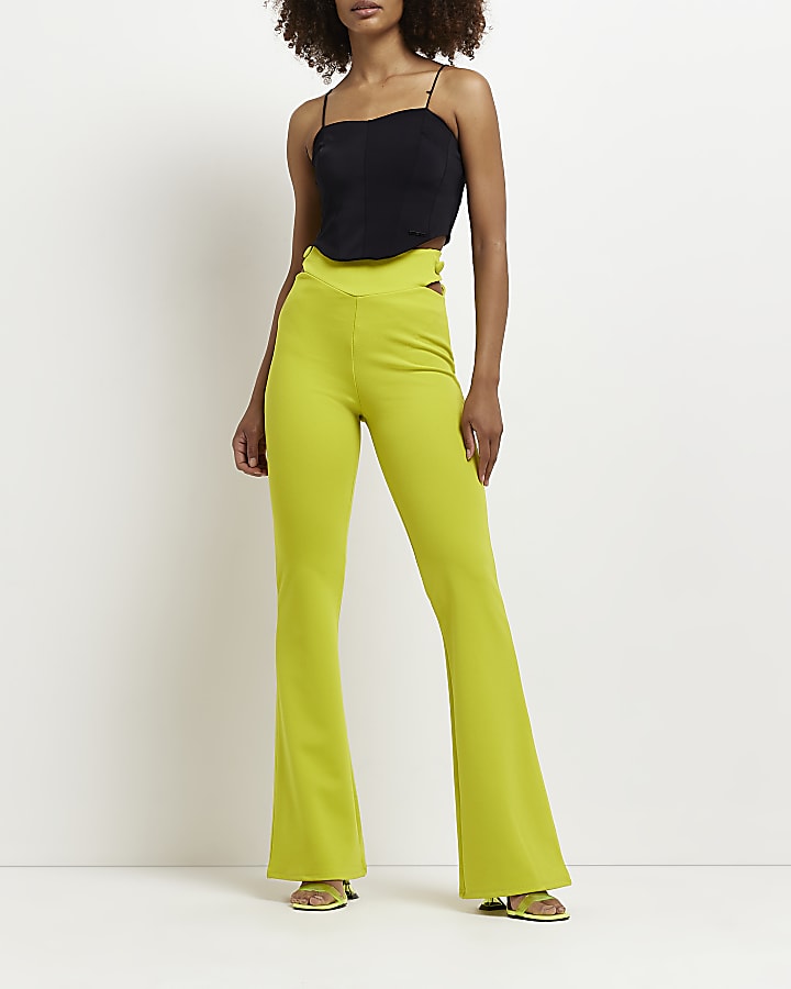 Lime green cut out flared trousers