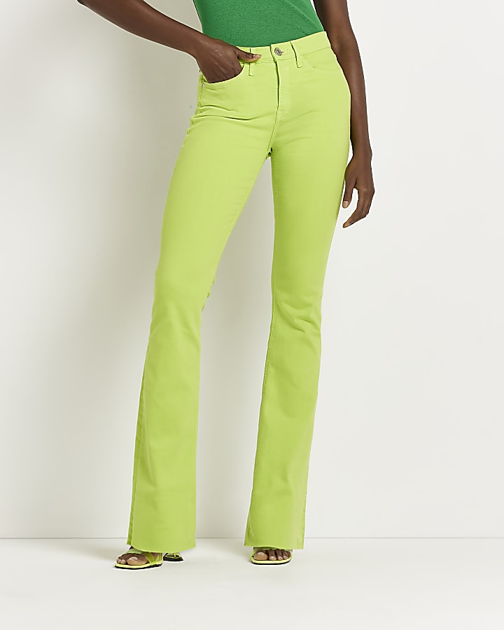 Lime green mid rise flared jeans
